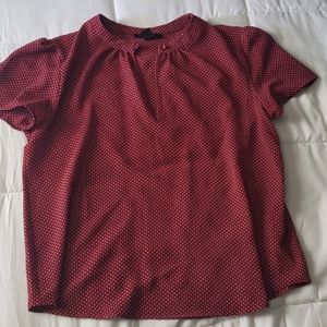Red polka-dot blouse